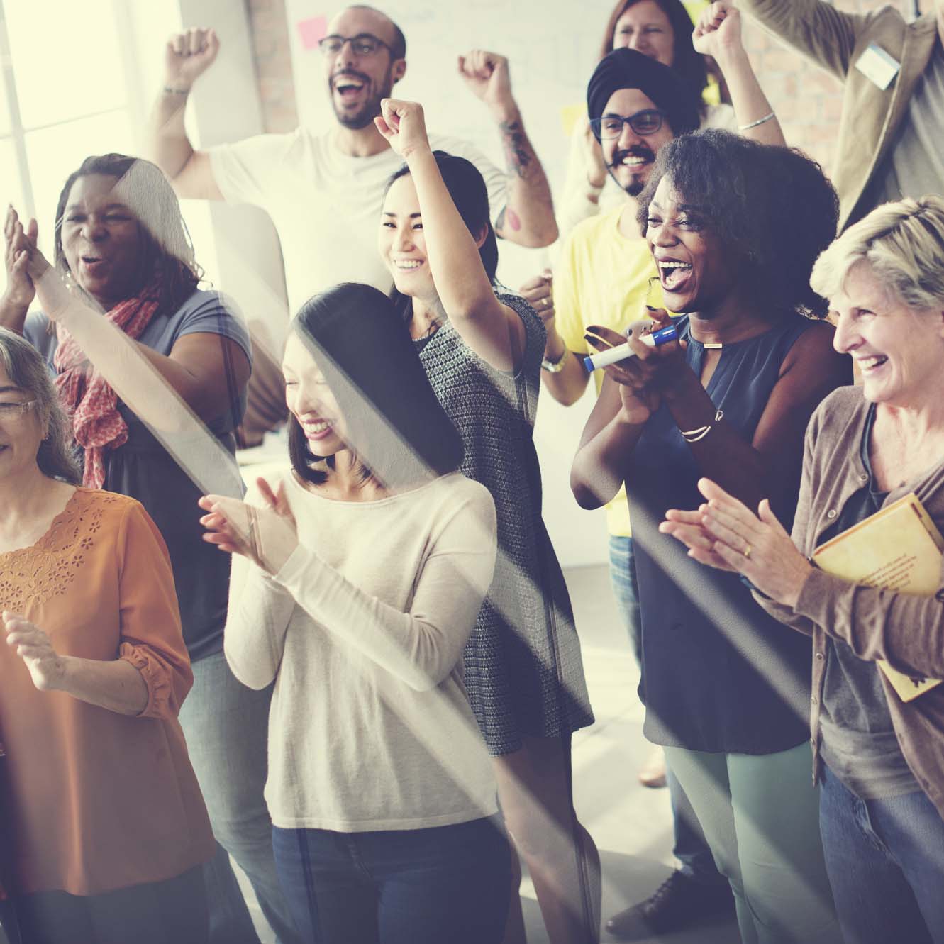 group of people cheering